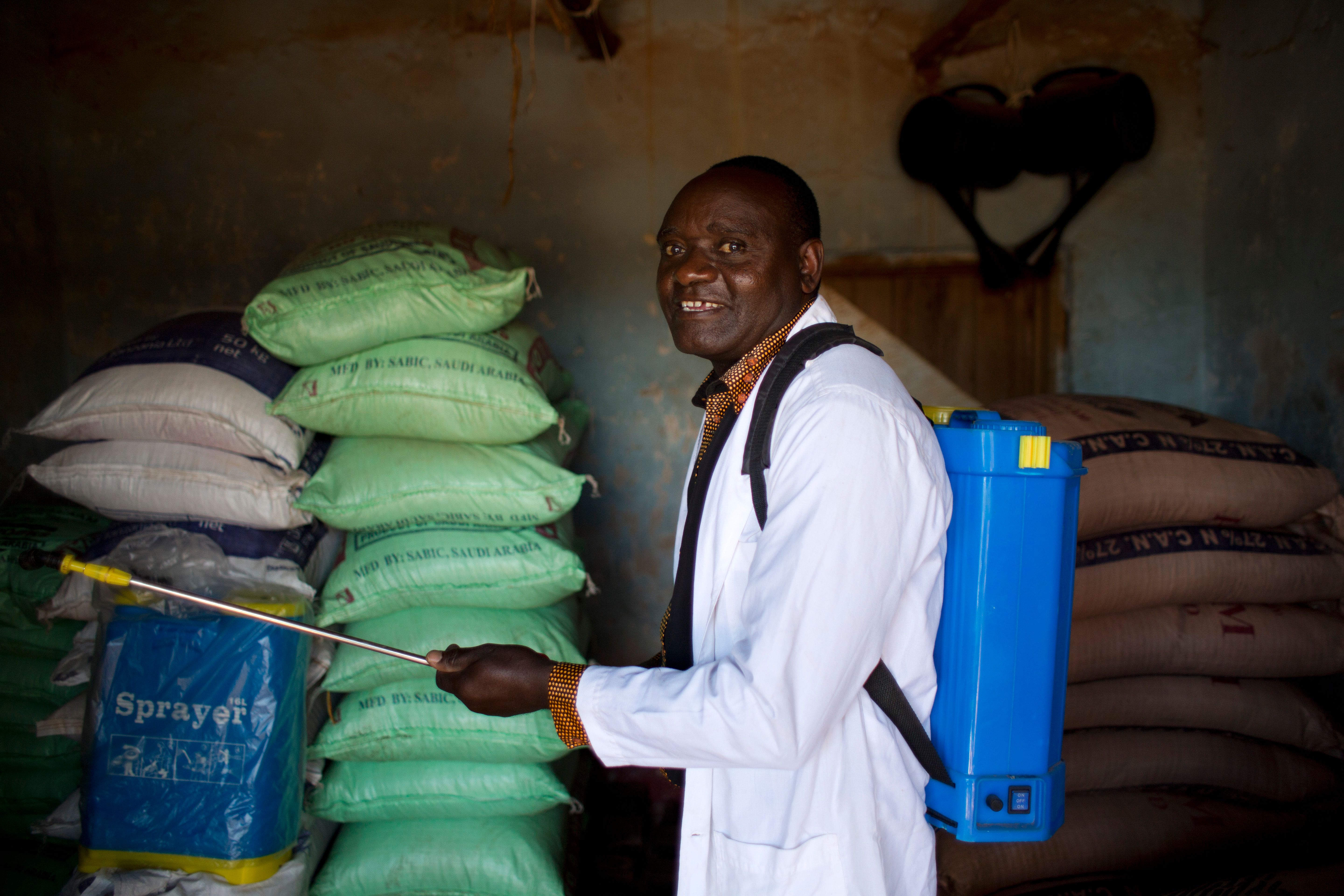 Secretary of the Mangakia Farmers Association, Sanctus Luhwago, stands inside his Agro shop, on Monday 25th July 2016 near Iringa, Tanzania. AGRA supports various AGRO shops in the country.